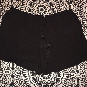 Atmosphere black shorts with tassels